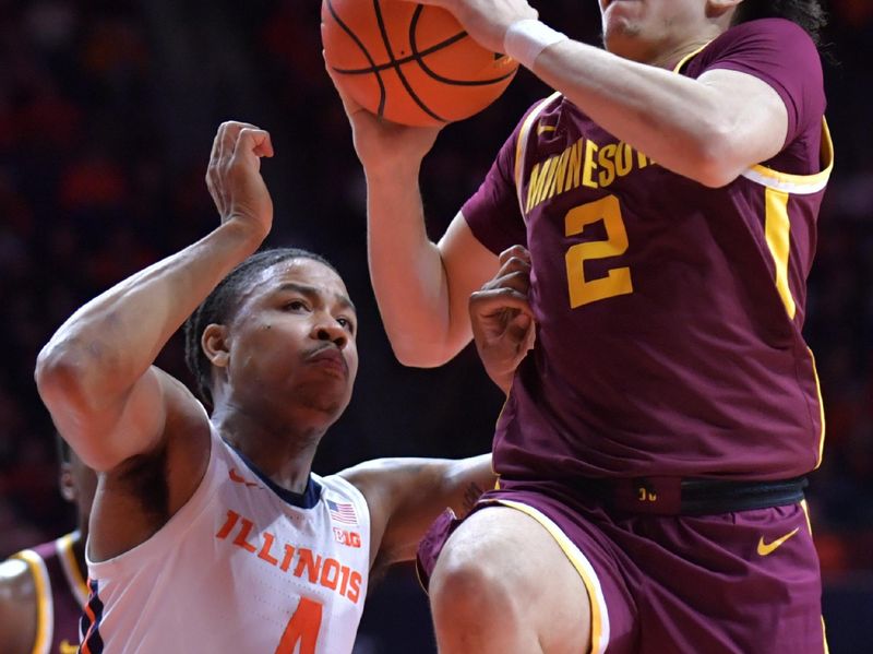 Feb 28, 2024; Champaign, Illinois, USA; Minnesota Golden Gophers guard Mike Mitchell Jr. (2) drives past Illinois Fighting Illini guard Justin Harmon (4) during the second half at State Farm Center. Mandatory Credit: Ron Johnson-USA TODAY Sports