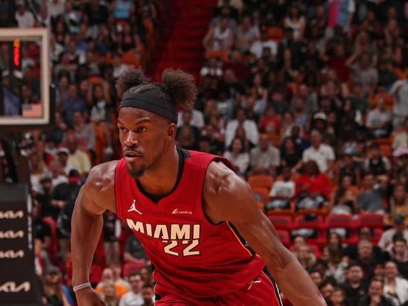 MIAMI, FL - MARCH 10: Jimmy Butler #22 of the Miami Heat handles the ball during the game against the Washington Wizards on March 10, 2024 at Kaseya Center in Miami, Florida. NOTE TO USER: User expressly acknowledges and agrees that, by downloading and or using this Photograph, user is consenting to the terms and conditions of the Getty Images License Agreement. Mandatory Copyright Notice: Copyright 2024 NBAE (Photo by Issac Baldizon/NBAE via Getty Images)