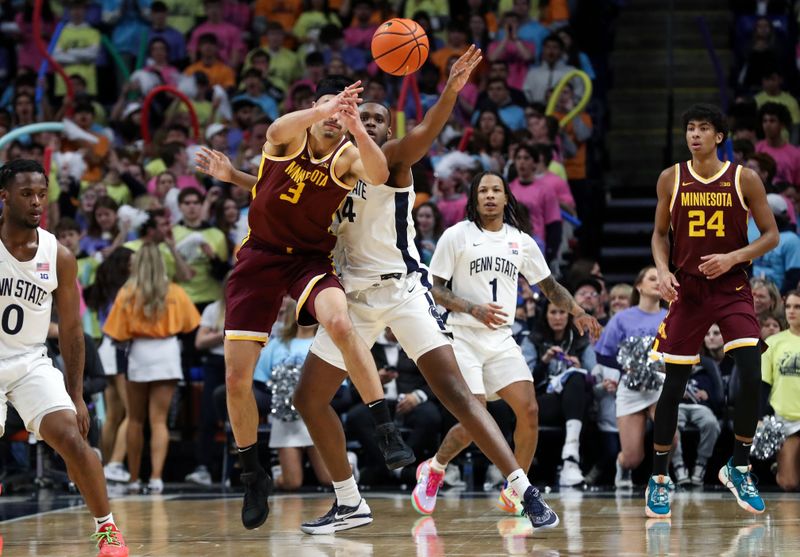 Jan 27, 2024; University Park, Pennsylvania, USA; Penn State Nittany Lions forward Demetrius Lilley (14) tips the ball away from Minnesota Golden Gophers forward Dawson Garcia (3) during the first half at Bryce Jordan Center. Minnesota defeated Penn State 83-74. Mandatory Credit: Matthew O'Haren-USA TODAY Sports