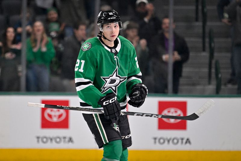 Jan 31, 2025; Dallas, Texas, USA; Dallas Stars left wing Jason Robertson (21) skates off the ice after he scores an empty net goal against against the Vancouver Canucks during the third period at the American Airlines Center. Mandatory Credit: Jerome Miron-Imagn Images