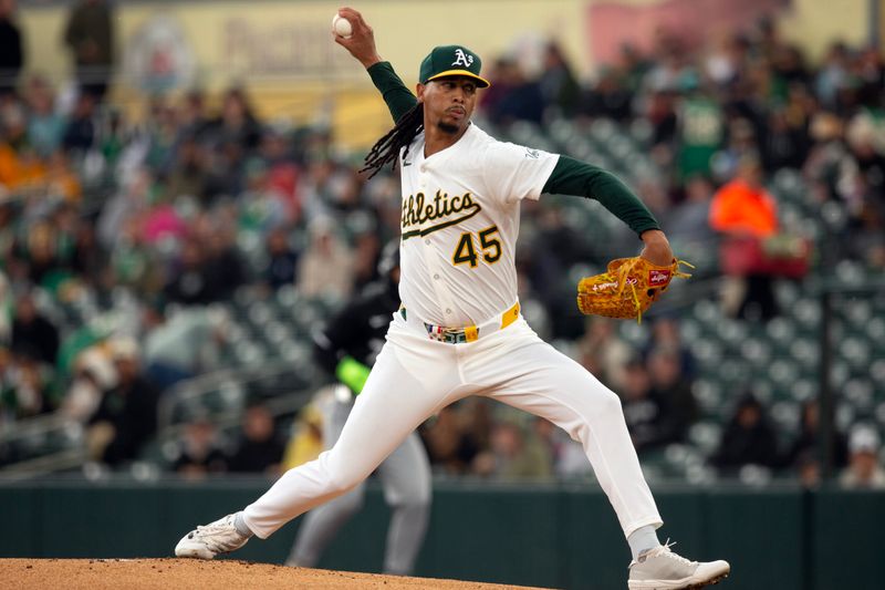 Apr 27, 2025; West Sacramento, California, USA; Athletics starting pitcher Osvaldo Bido (45) delivers a pitch against the Chicago White Sox during the first inning at Sutter Health Park. Mandatory Credit: D. Ross Cameron-Imagn Images