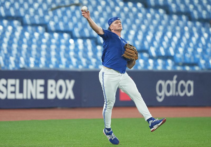 Jun 28, 2023; Toronto, Ontario, CAN; Toronto Blue Jays third baseman Matt Chapman (26) throws a ball to first base during batting practice against the San Francisco Giants at Rogers Centre. Mandatory Credit: Nick Turchiaro-USA TODAY Sports