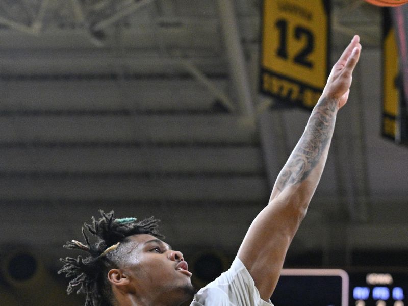 Mar 10, 2024; Iowa City, Iowa, USA; Illinois Fighting Illini guard Terrence Shannon Jr. (0) shoots the ball against the Iowa Hawkeyes during the first half at Carver-Hawkeye Arena. Mandatory Credit: Jeffrey Becker-USA TODAY Sports