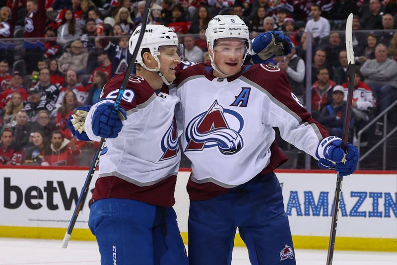 Feb 6, 2024; Newark, New Jersey, USA; Colorado Avalanche defenseman Cale Makar (8) celebrates his goal against the New Jersey Devils during the third period at Prudential Center. Mandatory Credit: Ed Mulholland-USA TODAY Sports