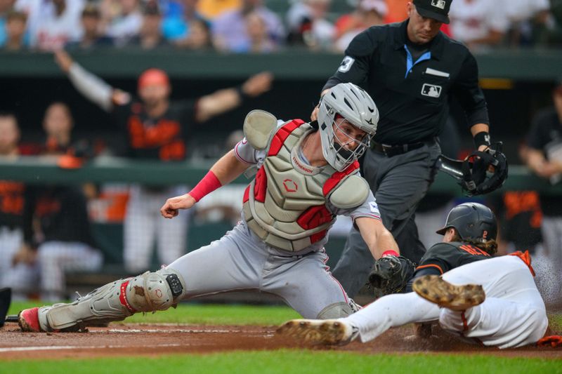 Jun 28, 2023; Baltimore, Maryland, USA; Cincinnati Reds catcher Tyler Stephenson (37) tags out Baltimore Orioles third baseman Gunnar Henderson (2) attempting to score at home plate during the first inning at Oriole Park at Camden Yards. Mandatory Credit: Reggie Hildred-USA TODAY Sports