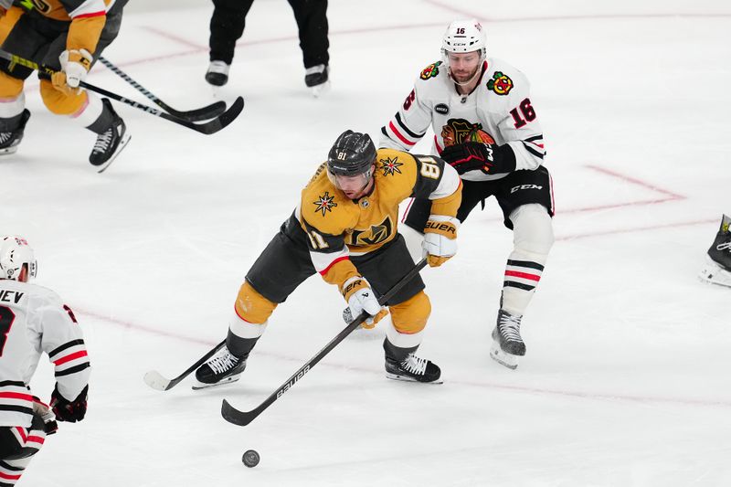 Apr 16, 2024; Las Vegas, Nevada, USA; Vegas Golden Knights right wing Jonathan Marchessault (81) controls the puck in front of Chicago Blackhawks center Jason Dickinson (16) during the third period at T-Mobile Arena. Mandatory Credit: Stephen R. Sylvanie-USA TODAY Sports