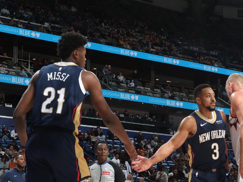 NEW ORLEANS, LA - DECEMBER 5: CJ McCollum #3 of the New Orleans Pelicans high fives teammate against the Phoenix Suns during the game on December 5, 2024 at the Smoothie King Center in New Orleans, Louisiana. NOTE TO USER: User expressly acknowledges and agrees that, by downloading and or using this Photograph, user is consenting to the terms and conditions of the Getty Images License Agreement. Mandatory Copyright Notice: Copyright 2024 NBAE (Photo by Layne Murdoch Jr./NBAE via Getty Images)