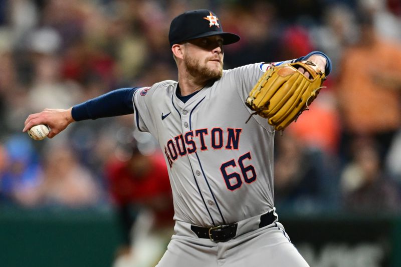 Sep 28, 2024; Cleveland, Ohio, USA; Houston Astros relief pitcher Shawn Dubin (66) throws a pitch during the ninth inning against the Cleveland Guardians at Progressive Field. Mandatory Credit: Ken Blaze-Imagn Images