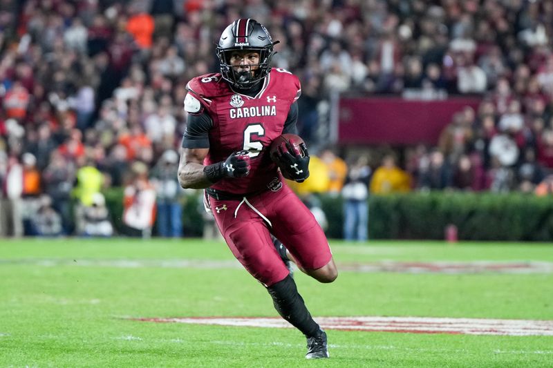 Nov 25, 2023; Columbia, South Carolina, USA; South Carolina Gamecocks tight end Joshua Simon (6) runs the ball against the Clemson Tigers in the first half at Williams-Brice Stadium. Mandatory Credit: David Yeazell-USA TODAY Sports