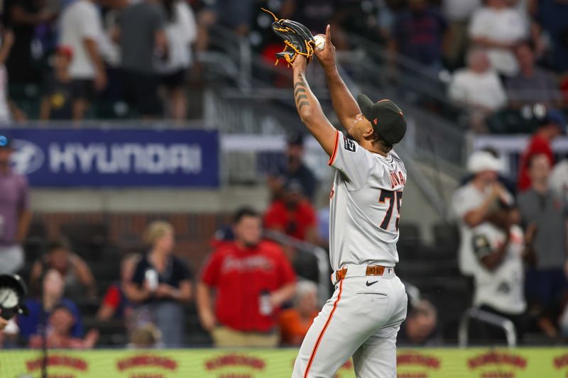 Jul 2, 2024; Atlanta, Georgia, USA; San Francisco Giants relief pitcher Camilo Doval (75) celebrates after a victory against the Atlanta Braves at Truist Park. Mandatory Credit: Brett Davis-USA TODAY Sports