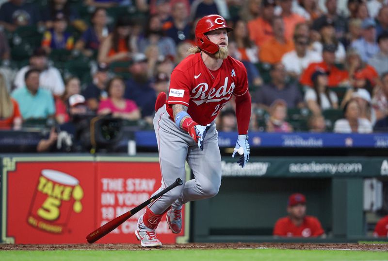 Jun 18, 2023; Houston, Texas, USA; Cincinnati Reds left fielder Jake Fraley (27) hits a home run during the second inning against the Houston Astros at Minute Maid Park. Mandatory Credit: Troy Taormina-USA TODAY Sports