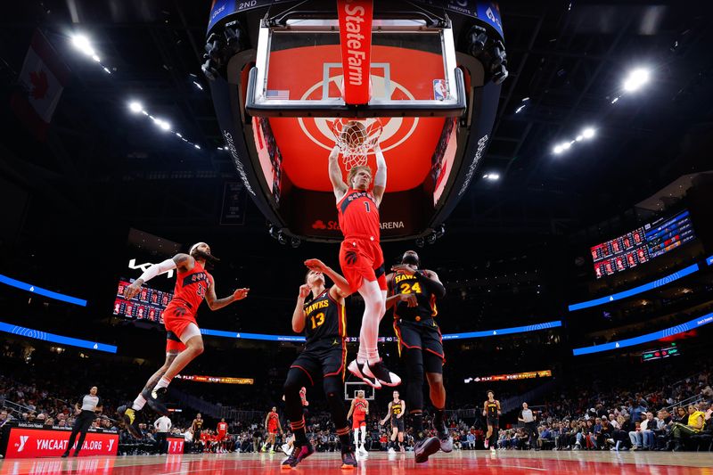 ATLANTA, GEORGIA - FEBRUARY 23: Gradey Dick #1 of the Toronto Raptors dunks during the first half against the Atlanta Hawks at State Farm Arena on February 23, 2024 in Atlanta, Georgia. NOTE TO USER: User expressly acknowledges and agrees that, by downloading and or using this photograph, User is consenting to the terms and conditions of the Getty Images License Agreement. (Photo by Todd Kirkland/Getty Images)