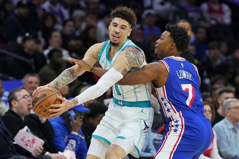 PHILADELPHIA, PENNSYLVANIA - NOVEMBER 10: LaMelo Ball #1 of the Charlotte Hornets controls the ball against Kyle Lowry #7 of the Philadelphia 76ers in the first half at the Wells Fargo Center on November 10, 2024 in Philadelphia, Pennsylvania. NOTE TO USER: User expressly acknowledges and agrees that, by downloading and/or using this photograph, user is consenting to the terms and conditions of the Getty Images License Agreement. (Photo by Mitchell Leff/Getty Images)