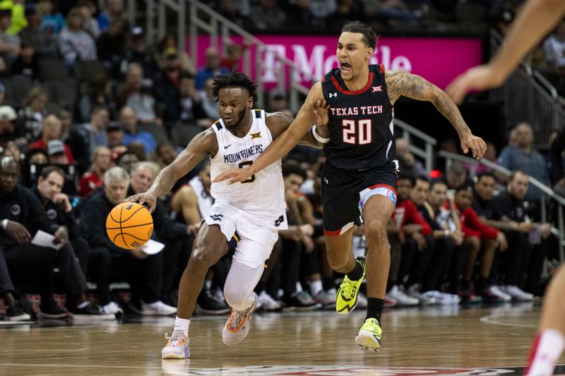 Mar 8, 2023; Kansas City, MO, USA; West Virginia Mountaineers guard Kedrian Johnson (0) dribbles the ball while defended by Texas Tech Red Raiders guard Jaylon Tyson (20) in the second half at T-Mobile Center. Mandatory Credit: Amy Kontras-USA TODAY Sports