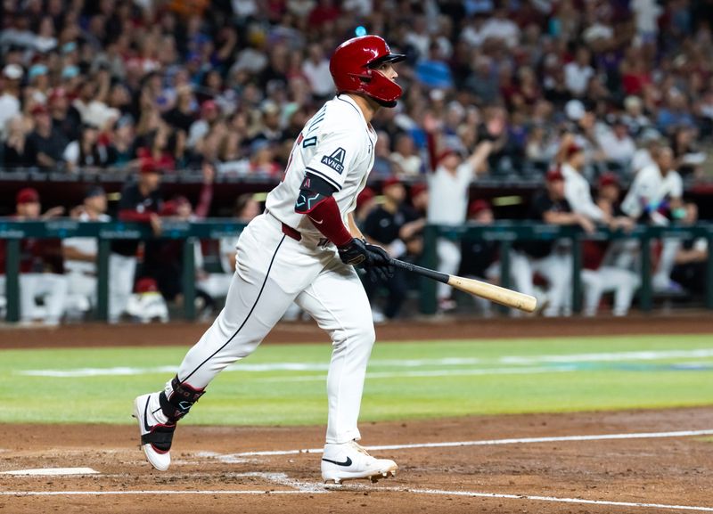 Sep 16, 2025; Phoenix, Arizona, USA; Arizona Diamondbacks catcher Adrian Del Castillo hits a two run home run in the second inning against the San Francisco Giants at Chase Field. Mandatory Credit: Mark J. Rebilas-Imagn Images