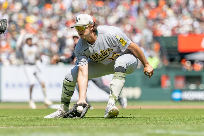 May 18, 2025; San Francisco, California, USA; Oakland Athletics first base Nick Kurtz (16) fields a grounder during the eighth inning against the San Francisco Giants at Oracle Park. Mandatory Credit: Bob Kupbens-Imagn Images