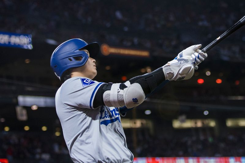 May 15, 2024; San Francisco, California, USA; Los Angeles Dodgers designated hitter Shohei Ohtani (17) on deck before batting against the San Francisco Giants during the seventh inning at Oracle Park. Mandatory Credit: John Hefti-USA TODAY Sports