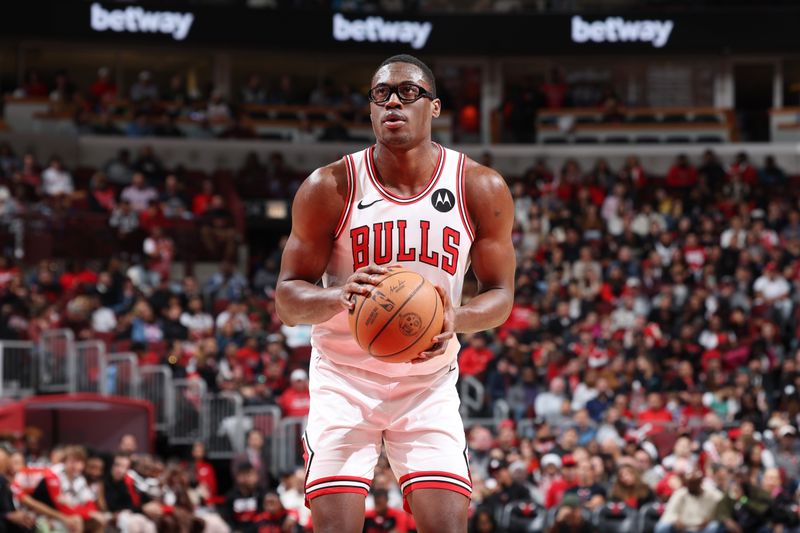 CHICAGO, IL - OCTOBER 18: Jalen Smith #7 of the Chicago Bulls shoots a free throw during the game against the Cleveland Cavaliers on October 18, 2024 at United Center in Chicago, Illinois. NOTE TO USER: User expressly acknowledges and agrees that, by downloading and or using this photograph, User is consenting to the terms and conditions of the Getty Images License Agreement. Mandatory Copyright Notice: Copyright 2023 NBAE (Photo by Jeff Haynes/NBAE via Getty Images)