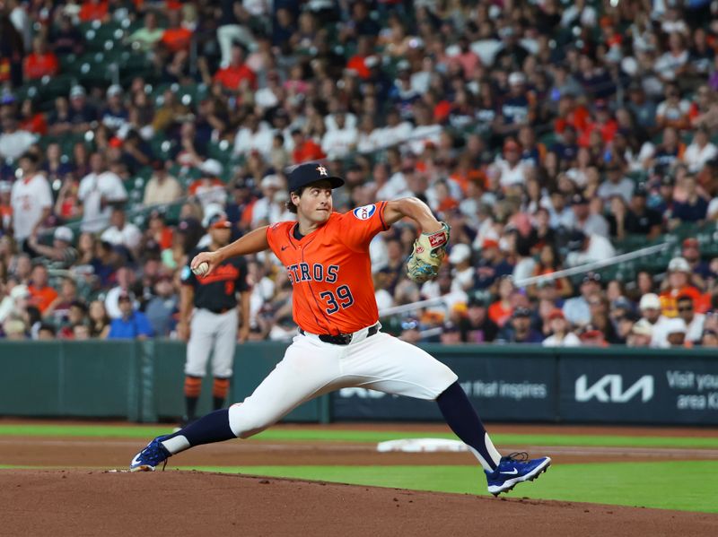 Jun 21, 2024; Houston, Texas, USA; Houston Astros starting pitcher Jake Bloss (39) pitches against the Baltimore Orioles in the first inning at Minute Maid Park. Mandatory Credit: Thomas Shea-USA TODAY Sports