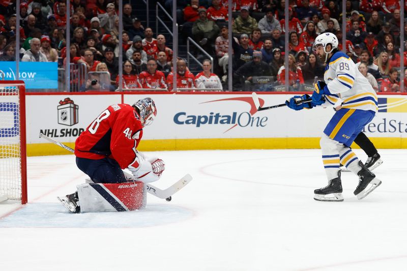 Dec 14, 2024; Washington, District of Columbia, USA; Washington Capitals goaltender Logan Thompson (48) makes a save on Buffalo Sabres right wing Alex Tuch (89) in the second period at Capital One Arena. Mandatory Credit: Geoff Burke-Imagn Images