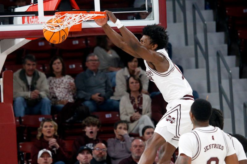 Dec 13, 2023; Starkville, Mississippi, USA; Mississippi State Bulldogs guard Trey Fort (11) dunks during the first half against the Murray State Racers at Humphrey Coliseum. Mandatory Credit: Petre Thomas-USA TODAY Sports