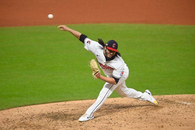 Oct 18, 2024; Cleveland, Ohio, USA; Cleveland Guardians pitcher Eli Morgan (49) pitches against the New York Yankees in the fifth inning during game four of the ALCS for the 2024 MLB playoffs at Progressive Field. Mandatory Credit: David Richard-Imagn Images