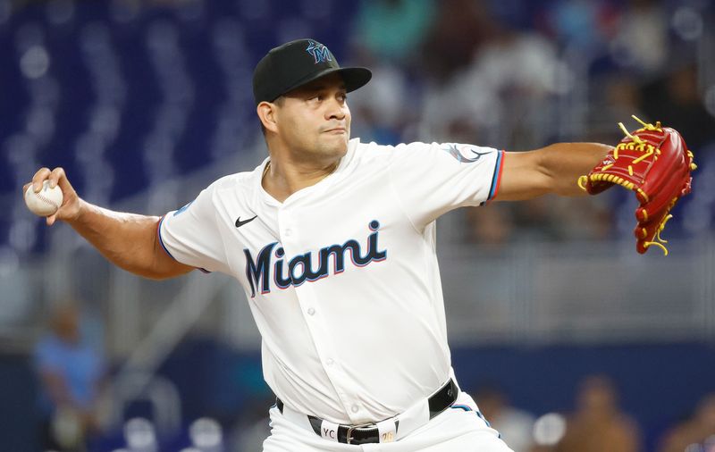 Jul 22, 2024; Miami, Florida, USA;  Miami Marlins starting pitcher Yonny Chirinos (26) pitches against the New York Mets in the first inning at loanDepot Park. Mandatory Credit: Rhona Wise-USA TODAY Sports