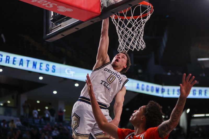 Mar 4, 2025; Atlanta, Georgia, USA; Georgia Tech Yellow Jackets guard Lance Terry (0) dunks against the Miami Hurricanes in the second half at McCamish Pavilion. Mandatory Credit: Brett Davis-Imagn Images