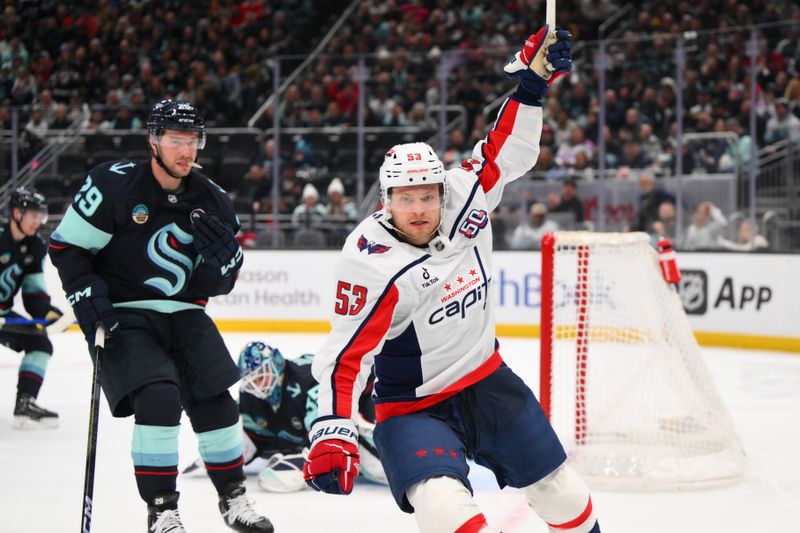 Jan 23, 2025; Seattle, Washington, USA; Washington Capitals center Ethen Frank (53) celebrates after scoring a goal against the Seattle Kraken during the second period at Climate Pledge Arena. Mandatory Credit: Steven Bisig-Imagn Images