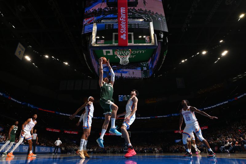 OKLAHOMA CITY, OK - APRIL 12: Brook Lopez #11 of the Milwaukee Bucks drives to the basket during the game against the Oklahoma City Thunder on April 12, 2024 at Paycom Arena in Oklahoma City, Oklahoma. NOTE TO USER: User expressly acknowledges and agrees that, by downloading and or using this photograph, User is consenting to the terms and conditions of the Getty Images License Agreement. Mandatory Copyright Notice: Copyright 2024 NBAE (Photo by Zach Beeker/NBAE via Getty Images)