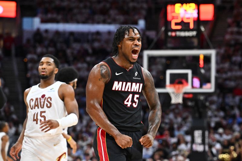 CLEVELAND, OHIO - APRIL 23: Davion Mitchell #45 of the Miami Heat reacts during the fourth quarter of game two of the first round of the Eastern Conference Playoffs against the Cleveland Cavaliers at Rocket Arena on April 23, 2025 in Cleveland, Ohio. The Cavaliers defeated the Heat 121-112. NOTE TO USER: User expressly acknowledges and agrees that, by downloading and or using this photograph, User is consenting to the terms and conditions of the Getty Images License Agreement. (Photo by Jason Miller/Getty Images)