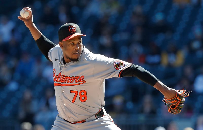 Apr 7, 2024; Pittsburgh, Pennsylvania, USA; Baltimore Orioles relief pitcher Yennier Cano (78) pitches against the Pittsburgh Pirates during the ninth inning at PNC Park. Mandatory Credit: Charles LeClaire-USA TODAY Sports