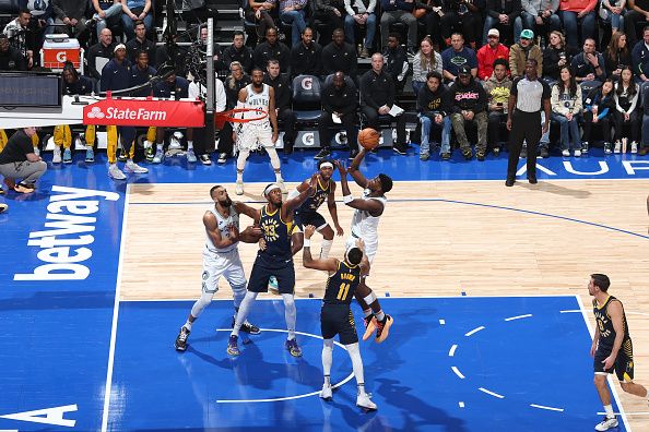 MINNEAPOLIS, MN -  DECEMBER 16: Anthony Edwards #5 of the Minnesota Timberwolves drives to the basket during the game against the Indiana Pacers on December 16 , 2023 at Target Center in Minneapolis, Minnesota. NOTE TO USER: User expressly acknowledges and agrees that, by downloading and or using this Photograph, user is consenting to the terms and conditions of the Getty Images License Agreement. Mandatory Copyright Notice: Copyright 2023 NBAE (Photo by David Sherman/NBAE via Getty Images)