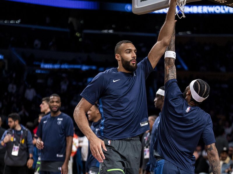 LOS ANGELES, CA - APRIL 7: Rudy Gobert #27 of the Minnesota Timberwolves is introduced before the game against the Los Angeles Lakers on April 7, 2024 at Crypto.Com Arena in Los Angeles, California. NOTE TO USER: User expressly acknowledges and agrees that, by downloading and/or using this Photograph, user is consenting to the terms and conditions of the Getty Images License Agreement. Mandatory Copyright Notice: Copyright 2024 NBAE (Photo by Tyler Ross/NBAE via Getty Images)