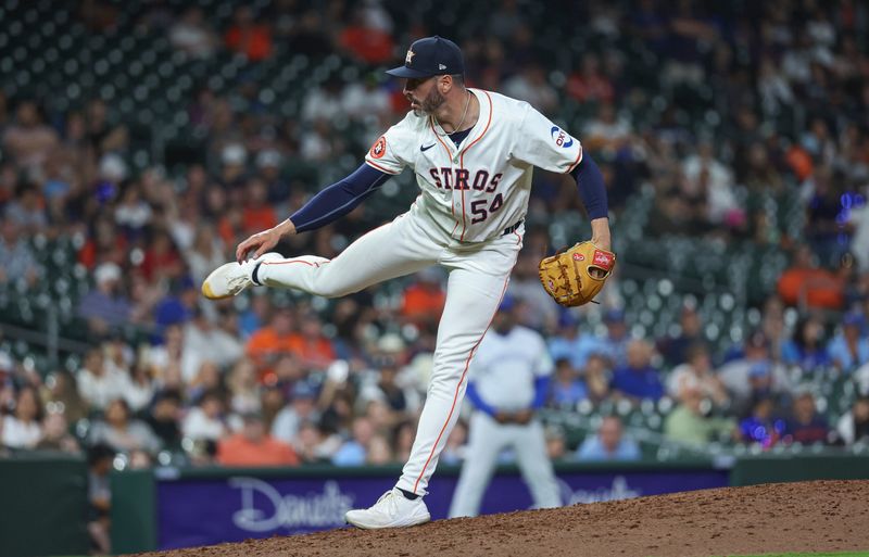 Apr 3, 2024; Houston, Texas, USA; Houston Astros relief pitcher Dylan Coleman (54) delivers a pitch during the ninth inning against the Toronto Blue Jays at Minute Maid Park. Mandatory Credit: Troy Taormina-USA TODAY Sports