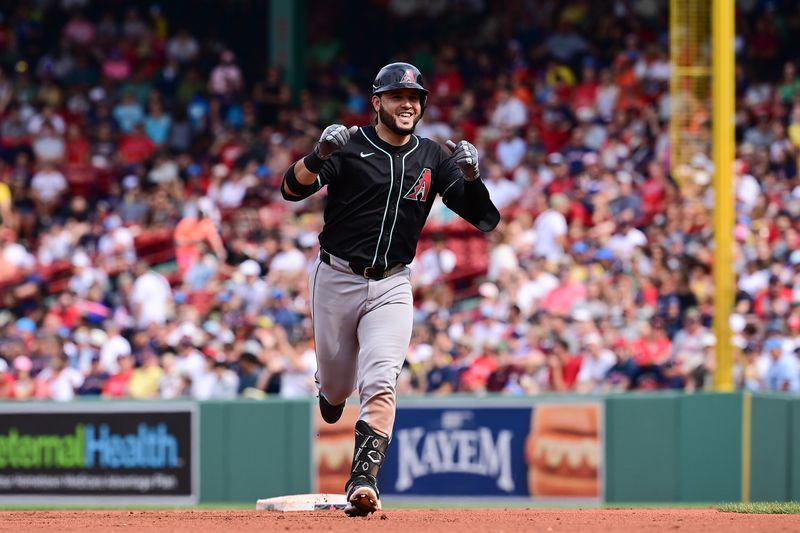 Aug 25, 2024; Boston, Massachusetts, USA; Arizona Diamondbacks third baseman Eugenio Suarez (28) runs out the bases after hitting a three run home run against the Boston Red Sox during the sixth inning at Fenway Park. Mandatory Credit: Eric Canha-USA TODAY Sports