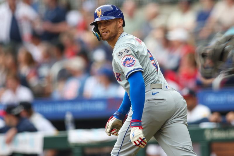 Sep 30, 2024; Atlanta, Georgia, USA; New York Mets left fielder Brandon Nimmo (9) looks back at teammates after a two-run home run against the Atlanta Braves in the eighth inning at Truist Park. Mandatory Credit: Brett Davis-Imagn Images