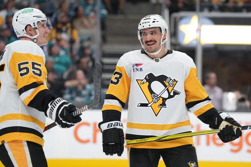 Nov 4, 2023; San Jose, California, USA; Pittsburgh Penguins left wing Matt Nieto (83) talks with center Noel Acciari (55) during the second period against the San Jose Sharks at SAP Center at San Jose. Mandatory Credit: Darren Yamashita-USA TODAY Sports