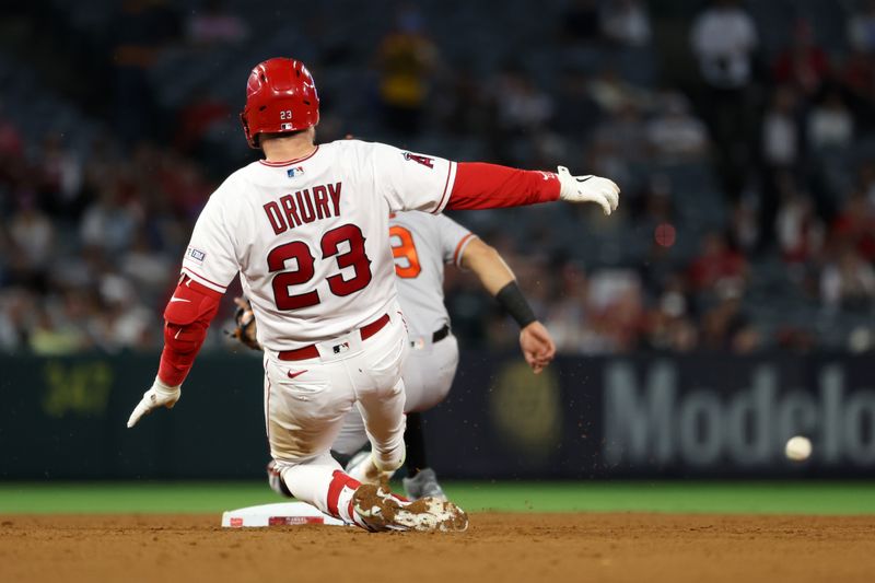 Sep 6, 2023; Anaheim, California, USA; Los Angeles Angels second baseman Brandon Drury (23) slides to a second base on a double during the sixth inning against the Baltimore Orioles at Angel Stadium. Mandatory Credit: Kiyoshi Mio-USA TODAY Sports