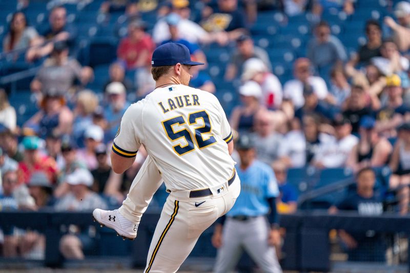 Mar 26, 2022; Phoenix, Arizona, USA; Milwaukee Brewers pitcher Eric Lauer (52) throws against the Seattle Mariners in the sixth inning during a spring training game at American Family Fields of Phoenix. Mandatory Credit: Allan Henry-USA TODAY Sports