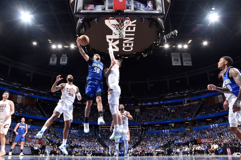 ORLANDO, FL - APRIL 25: Cole Anthony #50 of the Orlando Magic goes to the basket during the game against the Cleveland Cavaliers during Round 1 Game 3 of the 2024 NBA Playoffs on April 25, 2024 at Kia Center in Orlando, Florida. NOTE TO USER: User expressly acknowledges and agrees that, by downloading and or using this photograph, User is consenting to the terms and conditions of the Getty Images License Agreement. Mandatory Copyright Notice: Copyright 2023 NBAE (Photo by Fernando Medina/NBAE via Getty Images)