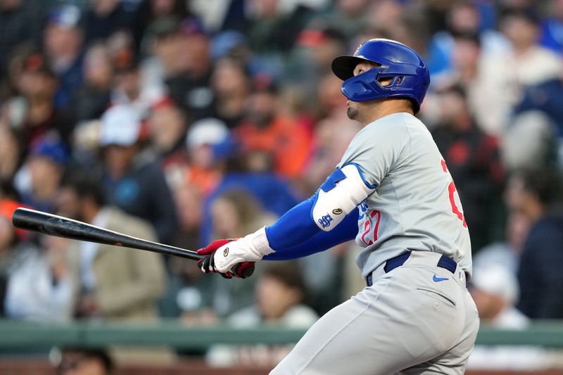 Jun 26, 2024; San Francisco, California, USA; Chicago Cubs designated hitter Seiya Suzuki (27) watches the flight of his home run against the San Francisco Giants during the fifth inning at Oracle Park. Mandatory Credit: Darren Yamashita-USA TODAY Sports