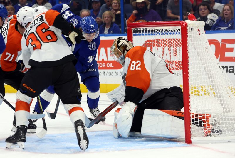 Nov 7, 2024; Tampa, Florida, USA; Tampa Bay Lightning left wing Brandon Hagel (38) shoots as Philadelphia Flyers goaltender Ivan Fedotov (82) defends during the third period at Amalie Arena. Mandatory Credit: Kim Klement Neitzel-Imagn Images