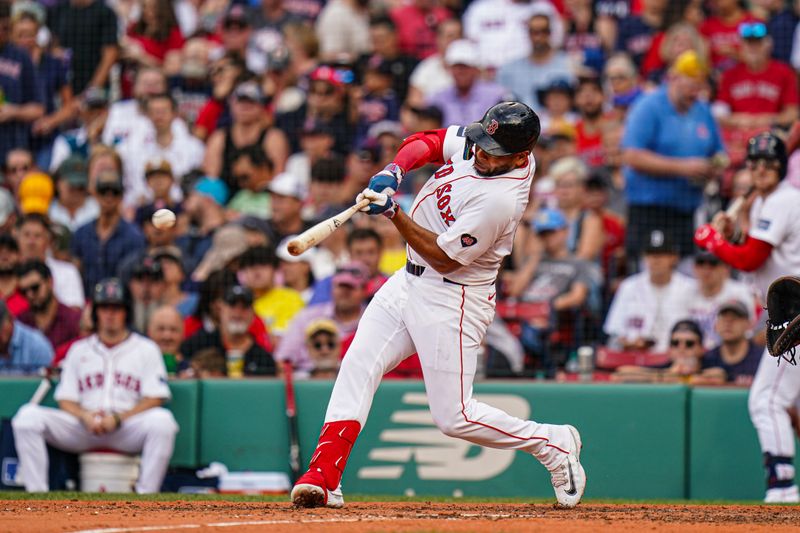 Jul 31, 2024; Boston, Massachusetts, USA; Boston Red Sox first baseman Dominic Smith (2) hits a double to right field against the Seattle Mariners in the sixth inning at Fenway Park. Mandatory Credit: David Butler II-USA TODAY Sports