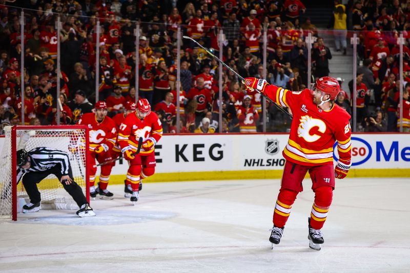 Dec 29, 2025; Calgary, Alberta, CAN; Calgary Flames left wing Blake Coleman (20) celebrates his goal against the Boston Bruins during the second period at Scotiabank Saddledome. Mandatory Credit: Sergei Belski-Imagn Images
