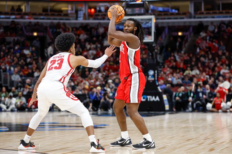 Mar 8, 2023; Chicago, IL, USA; Ohio State Buckeyes guard Bruce Thornton (2) looks to pass the ball against Wisconsin Badgers guard Chucky Hepburn (23) during the first half at United Center. Mandatory Credit: Kamil Krzaczynski-USA TODAY Sports