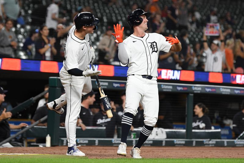 Aug 27, 2024; Detroit, Michigan, USA; Detroit Tigers designated hitter Kerry Carpenter (30) celebrates with first baseman Spencer Torkelson (20) after hitting a two-run home run against the Los Angeles Angels in the sixth inning at Comerica Park. Mandatory Credit: Lon Horwedel-USA TODAY Sports