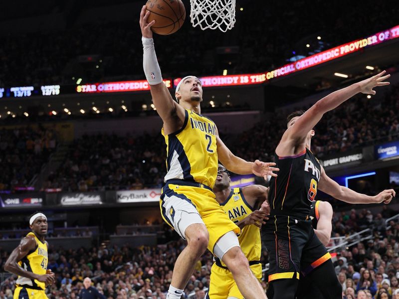 INDIANAPOLIS, INDIANA - JANUARY 26: Andrew Nembhard #2 of the Indiana Pacers shoots the ball while defended by Grayson Allen #8 of the Phoenix Suns in the second half of the Pacers 133-131 win at Gainbridge Fieldhouse on January 26, 2024 in Indianapolis, Indiana.    NOTE TO USER: User expressly acknowledges and agrees that, by downloading and or using this photograph, User is consenting to the terms and conditions of the Getty Images License Agreement.  (Photo by Andy Lyons/Getty Images)