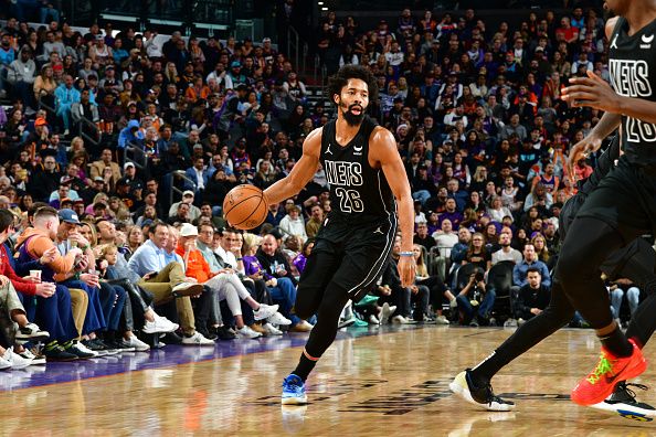 PHOENIX, AZ -DECEMBER 13: Spencer Dinwiddie #26 of the Brooklyn Nets dribbles the ball during the game against the Phoenix Suns on December 13, 2023 at Footprint Center in Phoenix, Arizona. NOTE TO USER: User expressly acknowledges and agrees that, by downloading and or using this photograph, user is consenting to the terms and conditions of the Getty Images License Agreement. Mandatory Copyright Notice: Copyright 2023 NBAE (Photo by Kate Frese/NBAE via Getty Images)