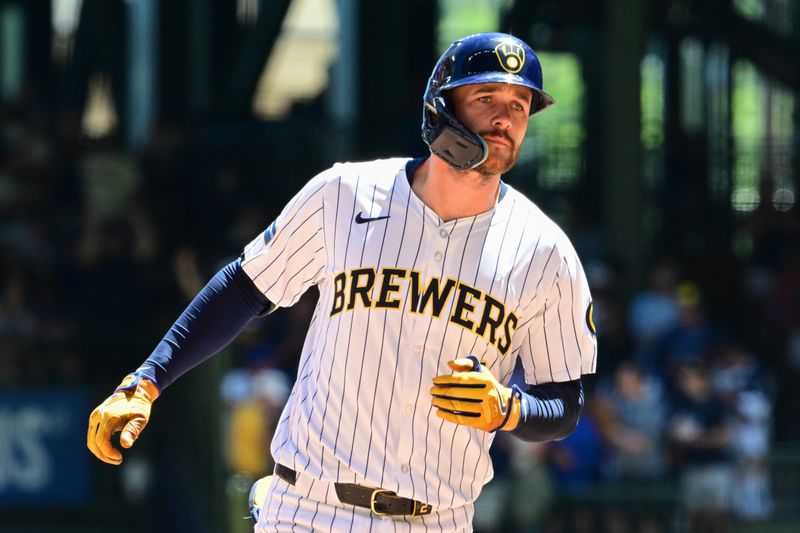 Jun 30, 2024; Milwaukee, Wisconsin, USA;  Milwaukee Brewers second baseman Brice Turang (2) runs the bases after hitting a grand slam home run in the fourth inning against the Chicago Cubs at American Family Field. Mandatory Credit: Benny Sieu-USA TODAY Sports